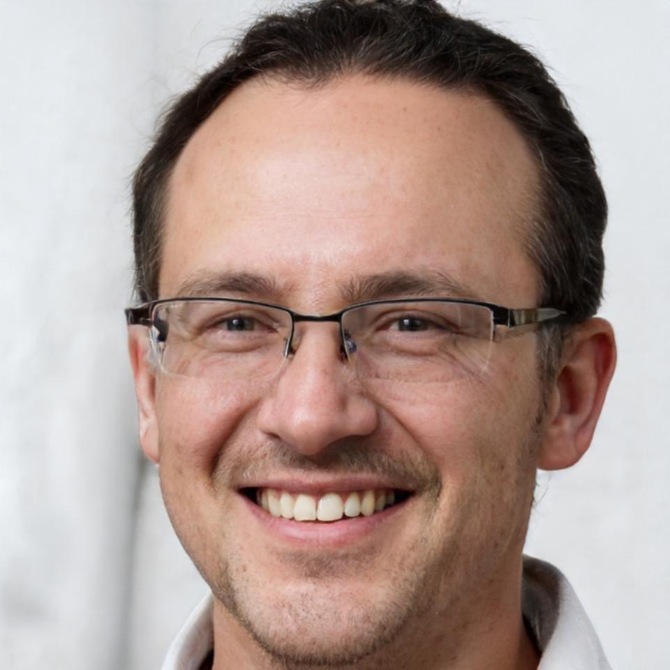 Professional headshot of Kieran Whitfield