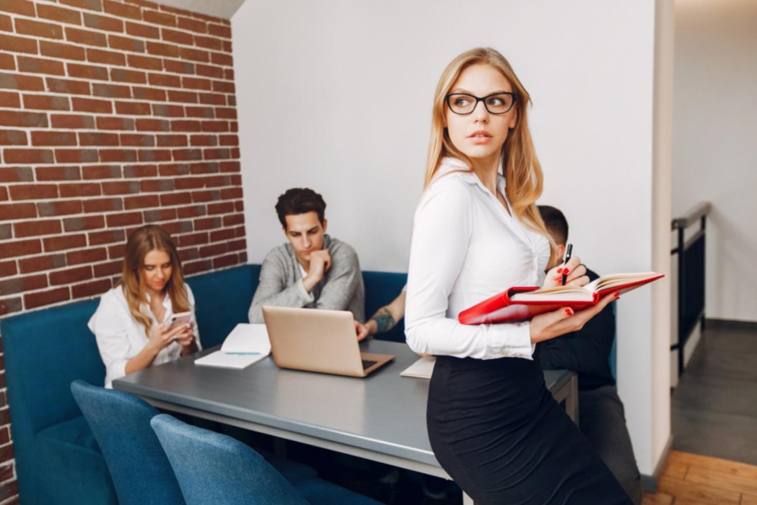 Budget planning workshop with participants working on personal financial spreadsheets